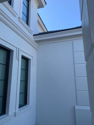 BEFORE: Gutter cleaning with new 4-inch round downspouts