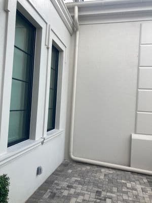 AFTER: Gutter cleaning with new 4-inch round downspouts